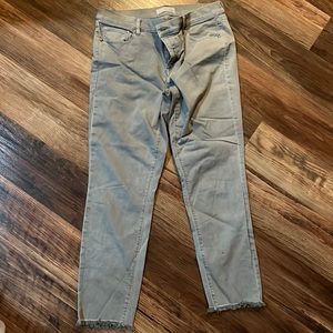 Cute light green/gray jeans with fringe on bottom size 29/8